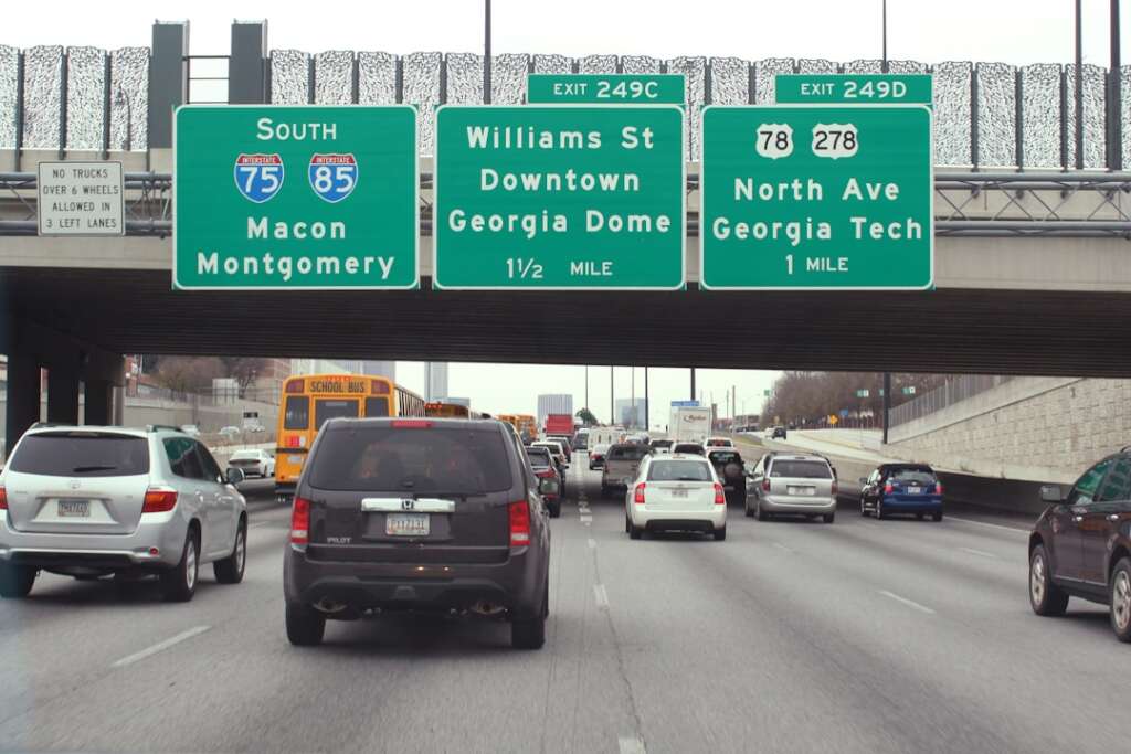 Atlanta highway traffic with visible Georgia highway signs