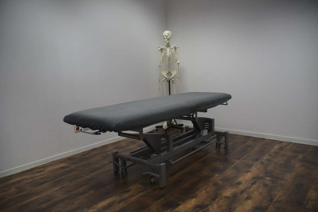 Medical treatment table used for spinal decompression therapy